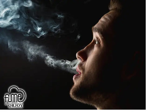 A bearded man exhales white vapor from a vape device against a dark background in an article about vaping pleasure.