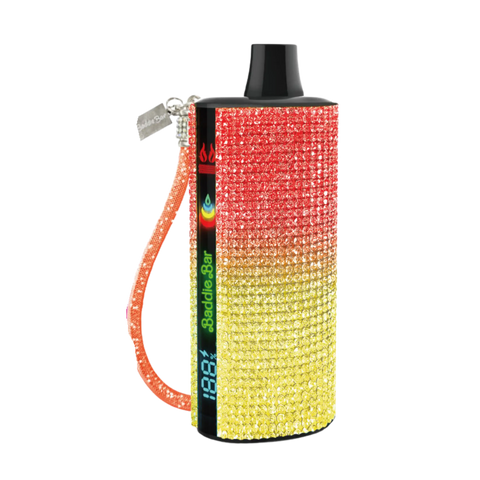 A sparkling baddie bar vape pen with red orange yellow rhinestones black top cap and a glittery orange wrist strap