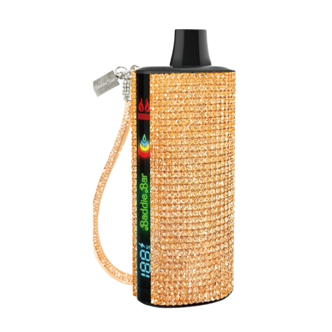 Gold rhinestone-covered Baddie Bar vape pen with black top and matching wrist strap for stylish vaping