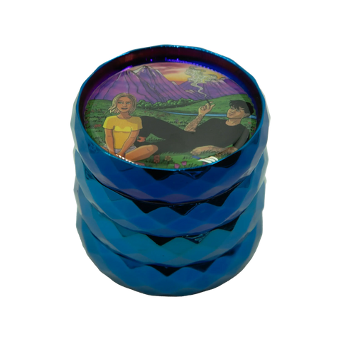 Vibrant blue metallic grinder with a colorful illustrated lid showing two people in a scenic landscape
