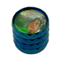 Blue metallic grinder with a colorful illustrated lid showing a couple in a mountainous landscape