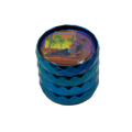 Blue metallic grinder featuring a colorful cartoon illustration of two people sitting on a couch