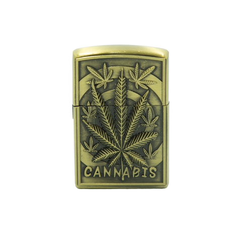 Antique brass-colored zippo lighter with embossed cannabis leaf design and cannabis engraving for relief use