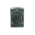 Silver-colored metal zippo-style lighter embossed with cannabis leaf and cannabis engraving for cannabis relief
