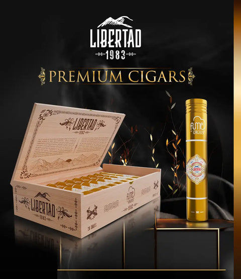 Gold-finished libertad 1983 cigar in a sleek, cylindrical design with an ornate label and embossed branding.