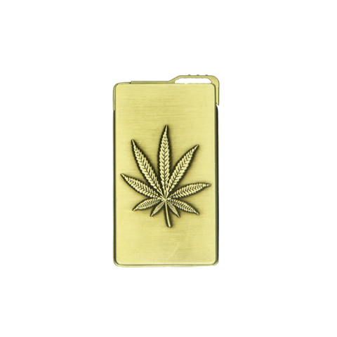 Gold-colored metal weed leaf lighter with embossed detailed cannabis leaf design on its surface