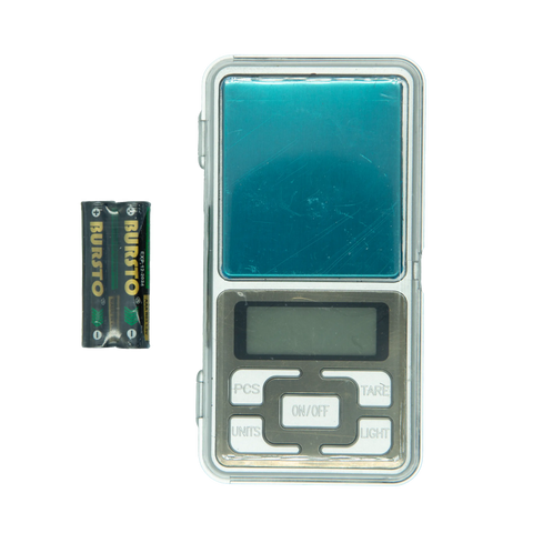 Compact pocket digital scale with translucent teal weighing platform silver buttons in clear plastic casing