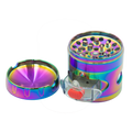 Iridescent stainless steel rainbow grinder with diamond design clear plastic handle and red button herb grinder