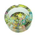 Rick and Morty glass ashtray with vibrant colorful cartoon illustration on clear glass interior surface