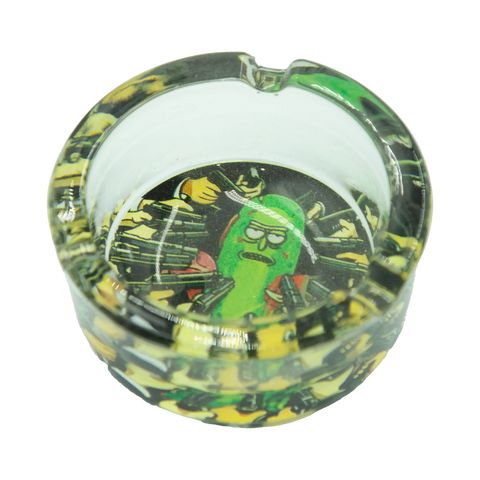 Clear glass rick and morty ashtray featuring a green pickle character with guns on a black and yellow camo pattern