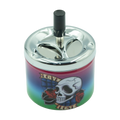 Chrome finished spinTop metal ashtray pop series with vibrant gradient skull and roses design and black cylindrical lid