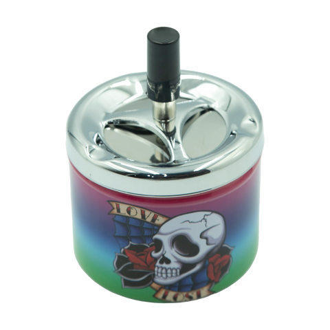 Chrome finished spinTop metal ashtray pop series with vibrant gradient skull and roses design and black cylindrical lid