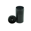 Black cylindrical metal herb grinder with textured grinding surface and central hole for easy handling stealth storage grinder