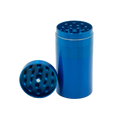 Blue cylindrical metal herb grinder with matching lid and grinding chamber from stealth storage grinder product