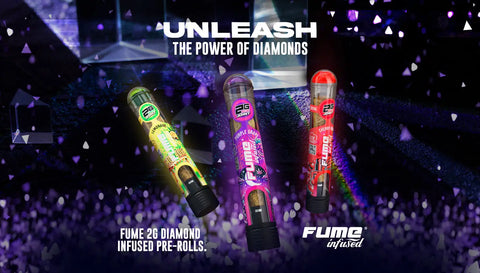 Three colorful, transparent cylindrical pre-roll containers with black caps and vibrant labels featuring the ’fume 26’’ branding.